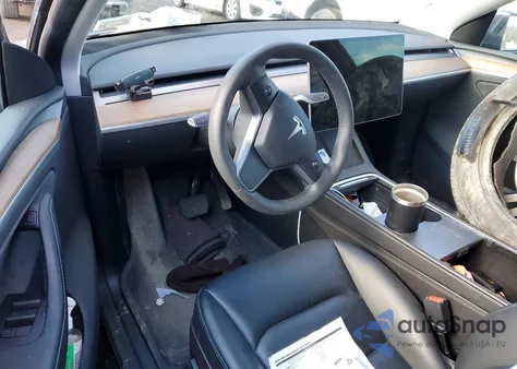 2023 Tesla Model Y from USA, damaged, VIN 7SAYGDEE3PA178930